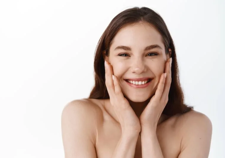 Smiling woman with glowing skin